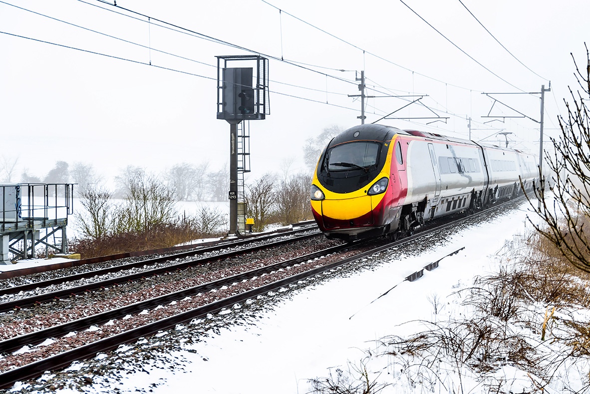 train-on-UK-railroad-in-snow.jpg